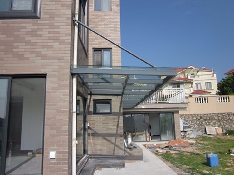 阳光玻璃雨棚 点式玻璃雨棚 远洋恒大